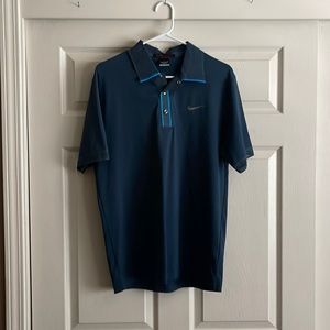 Nike Tiger Woods navy blue golf shirt.